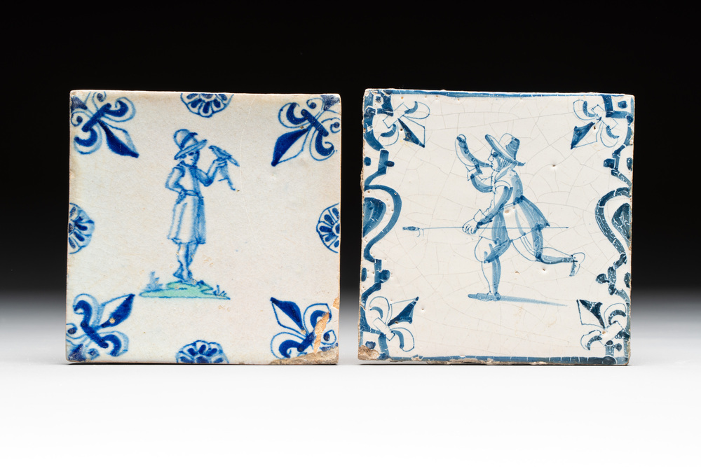 Two blue and white Dutch Delft 'horn blower' and 'falconer on green ground' tiles, 17th C.
