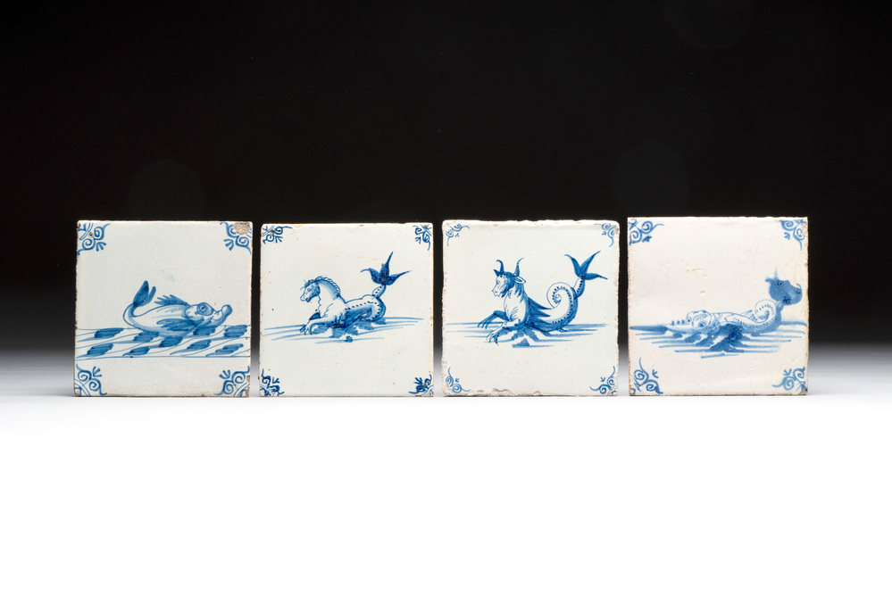 Four blue and white Dutch Delft tiles with sea creatures, 17th C.