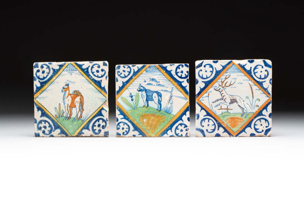 Three polychrome Dutch Delft 'animal' diamond tiles, 17th C.
