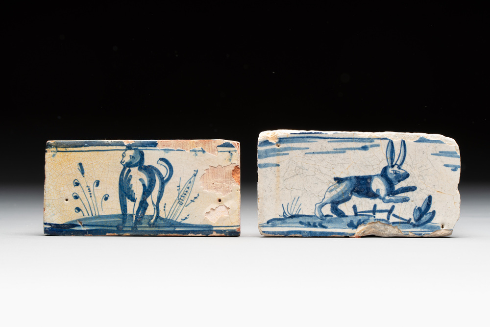 Two blue and white Dutch Delft 'dog' and 'rabbit' border tiles, late 16th C.