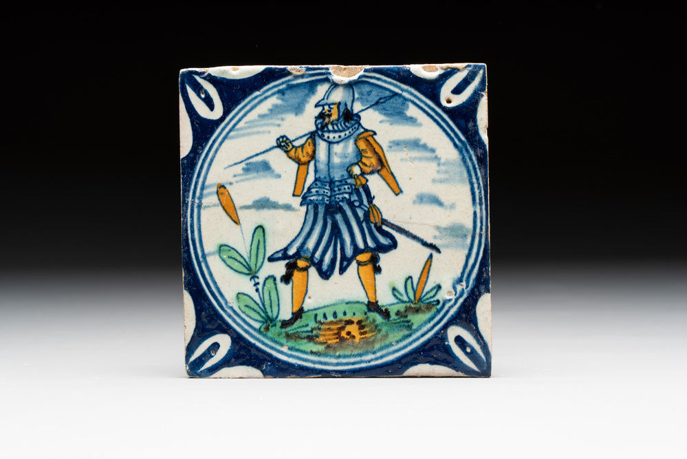 A polychrome Dutch Delft maiolica 'soldier' ​​medallion tile, late 16th C.