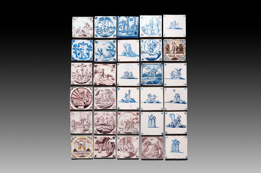 30 blue, white and manganese Dutch Delft 'biblical subject' tiles, 17/19th C.