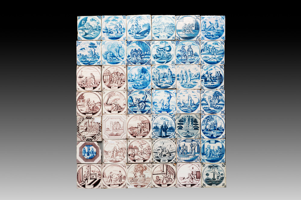 42 blue, white and manganese Dutch Delft 'biblical subject' tiles, 18/19th C.