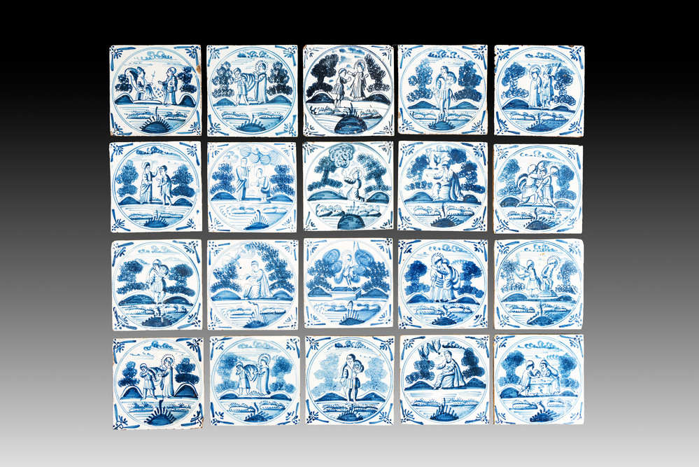 20 blue and white Dutch Delft 'biblical subject' tiles, 18th C.