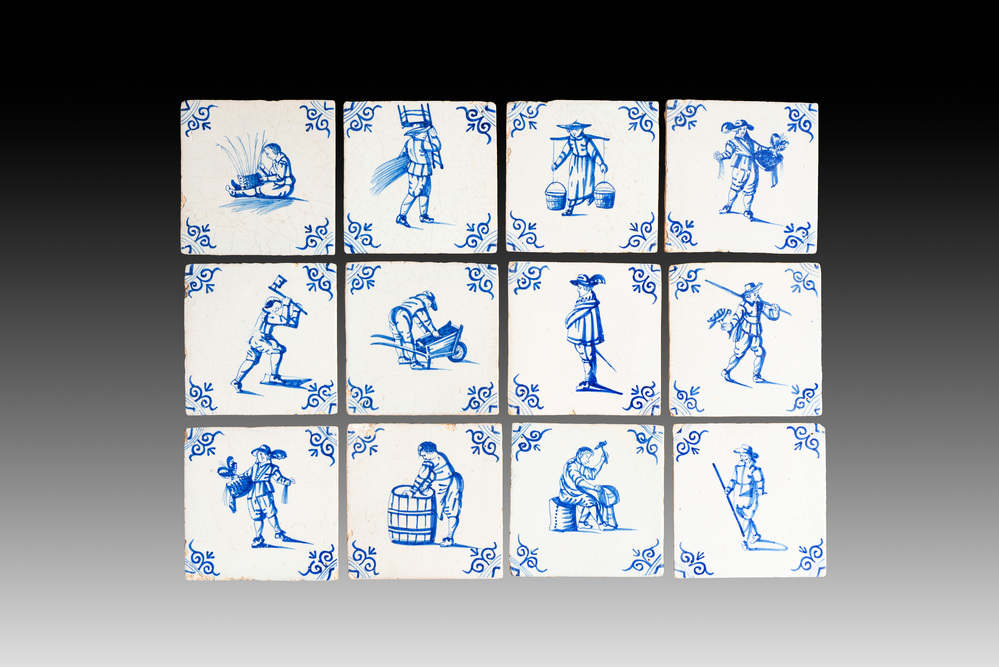 12 blue and white Dutch Delft 'crafts' tiles, 17th C.
