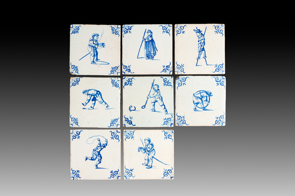 Eight blue and white Dutch Delft 'children's games' tiles, 17th C.