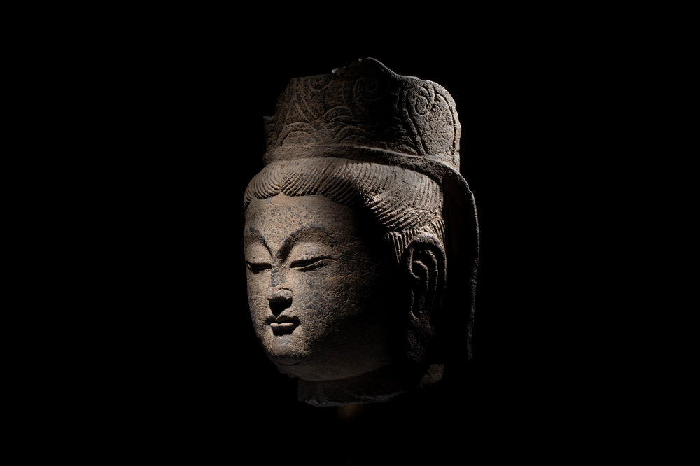 A Chinese stone head of Guanyin, Song/Ming