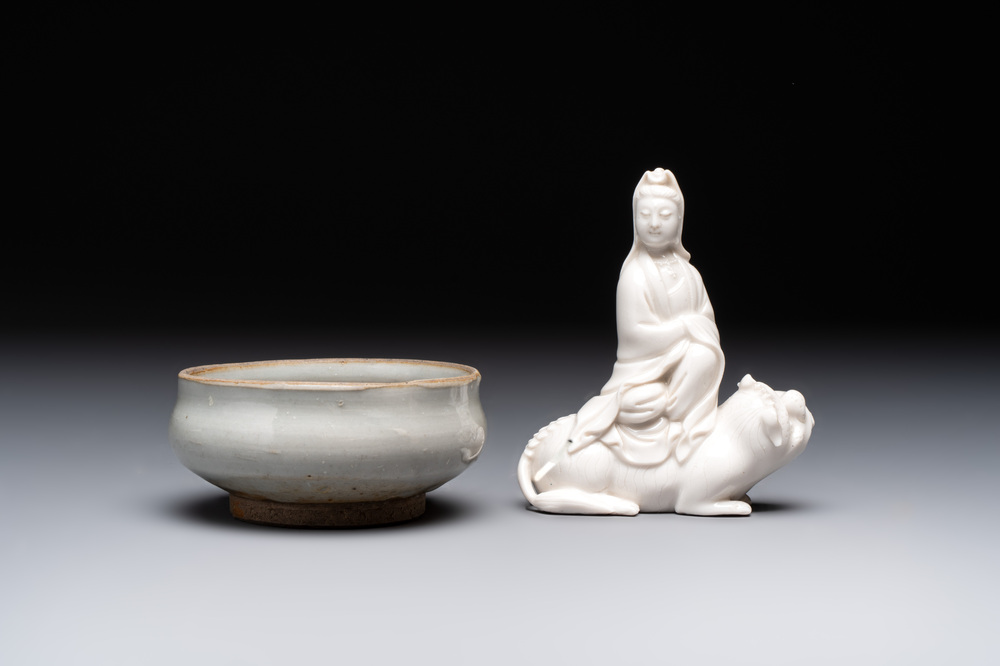 A Chinese 'jun' bowl and a Dehua blanc de Chine group with Guanyin, Ming/Qing