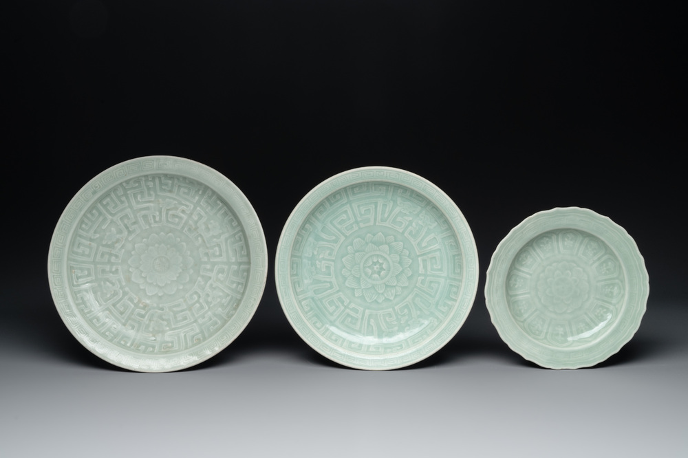 Three Chinese celadon-glazed plates with floral anhua design, 18/19th C.