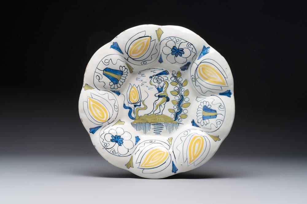 A rare polychrome Dutch Delft 'wildman' dish, 17th C.