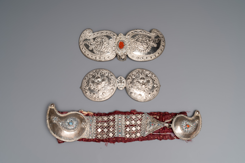 An Ottoman silver-plated wedding belt and two pairs of silver and copper buckles, 19th C.