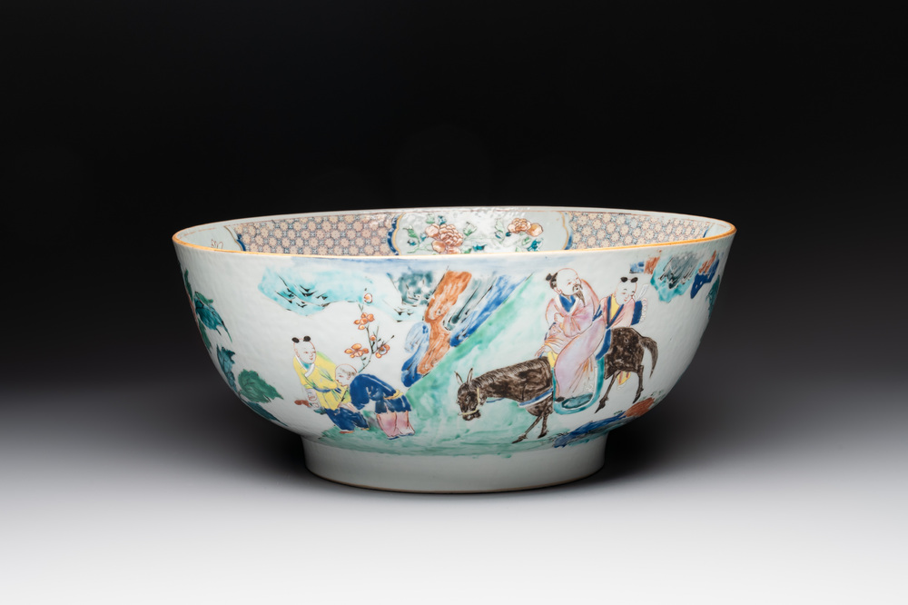 A fine Chinese famille rose bowl with figures, flowers and pheasants, Yongzheng/Qianlong