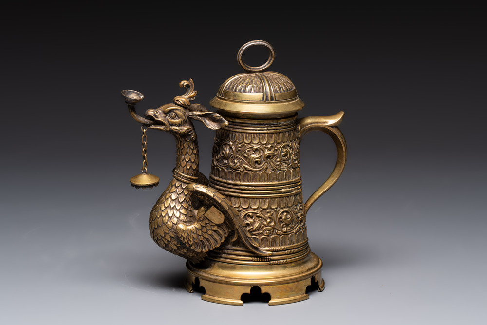 A brass griffin-form aquamanile, Germany, 19th C.