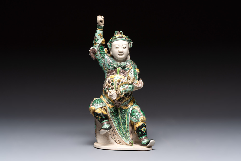 A fine Chinese verte biscuit sculpture of a warrior, 19th C.