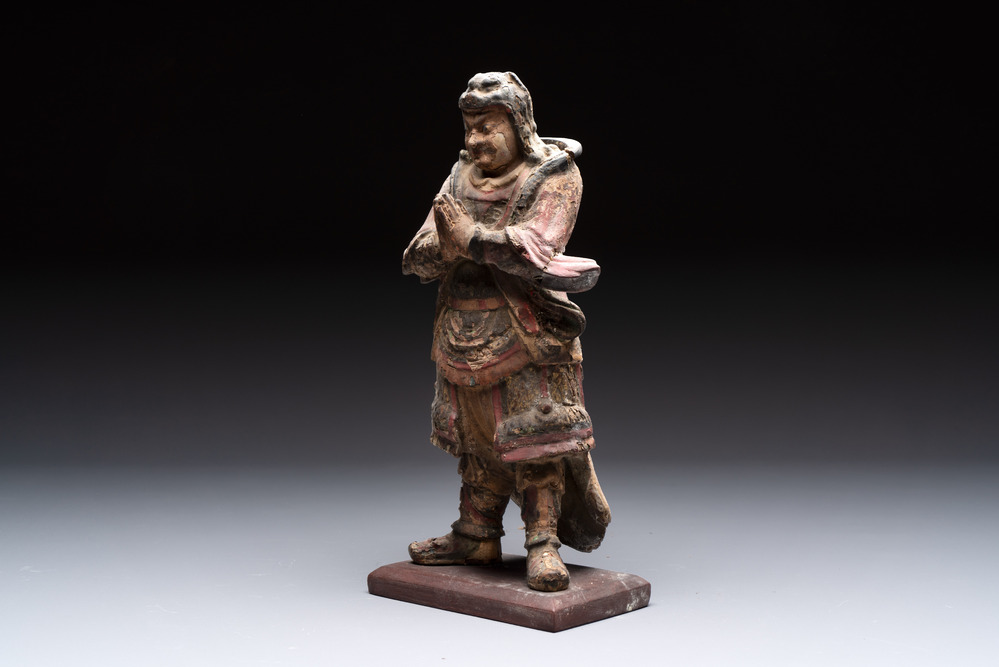 A Chinese polychrome lacquered wooden sculpture of Weituo, 17/18th C.