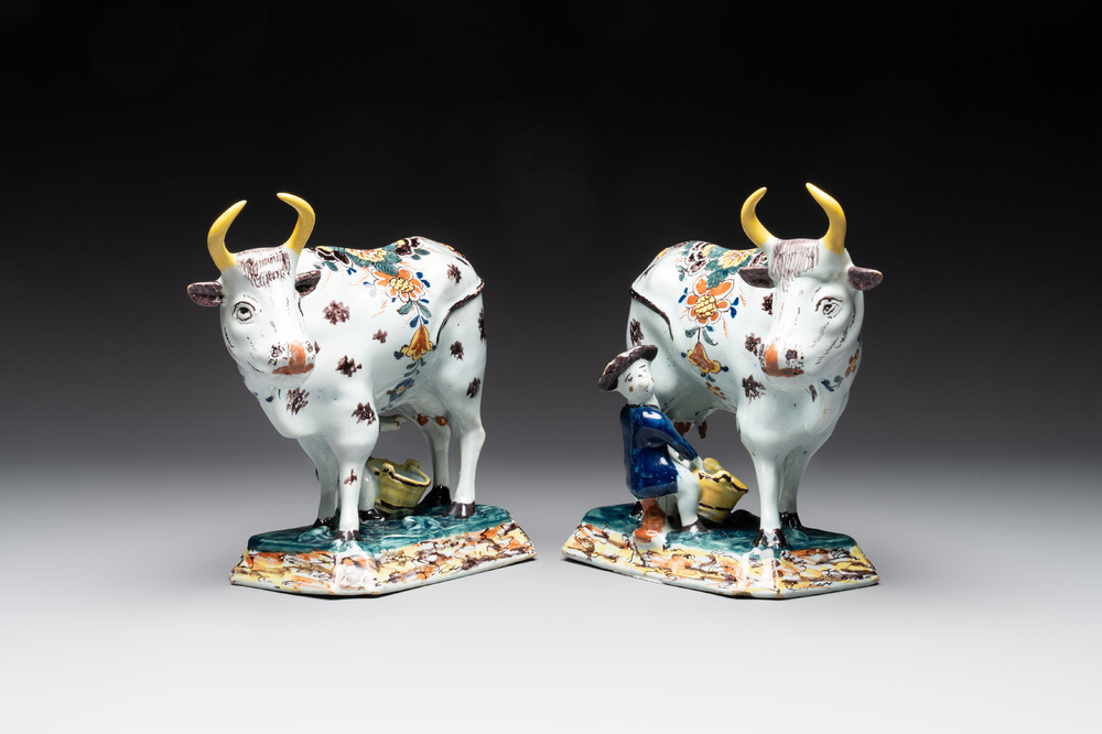 A pair of polychrome Dutch Delft milking groups, 18th C.
