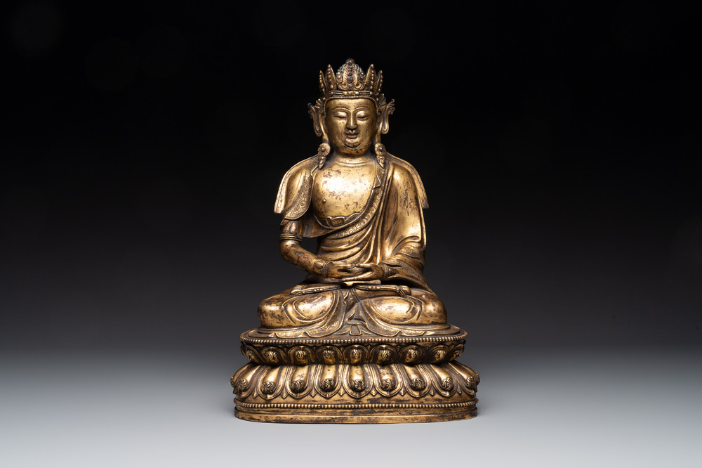 A large Sino-Tibetan gilt bronze Buddha, Xuande mark, possibly Ming