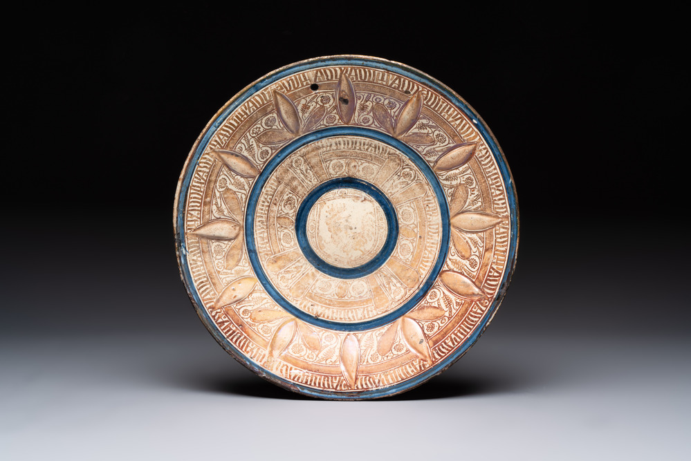 A Hispano-Moresque lustre-glazed dish with stylized floral design, Spain, 16th C.