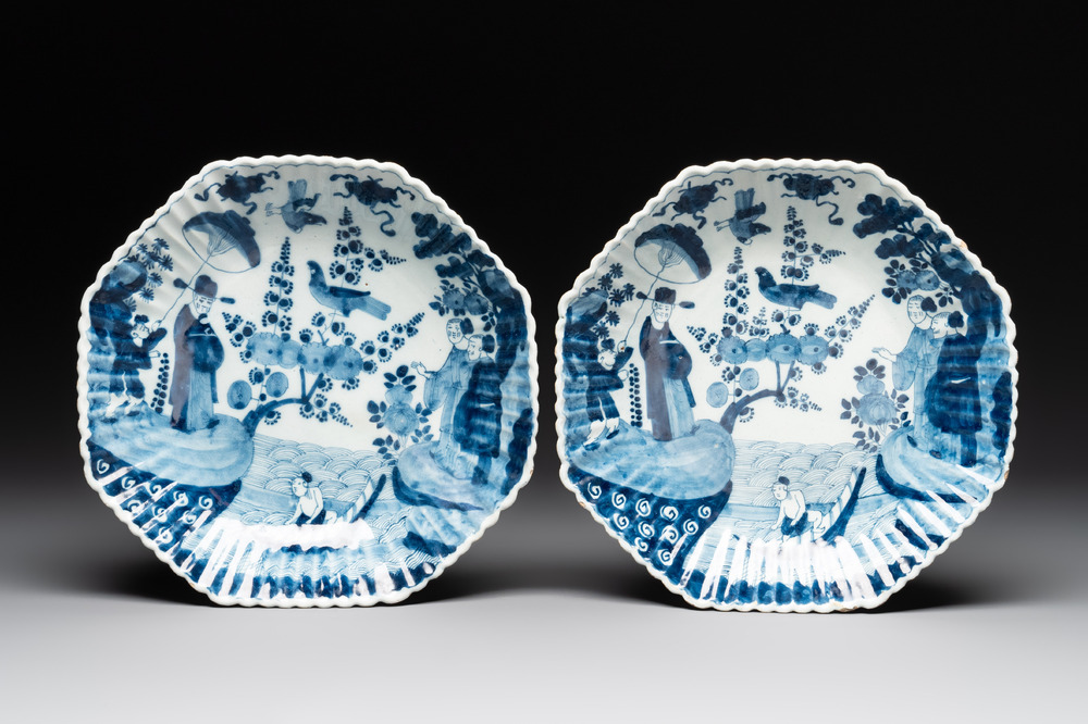 A pair of gadrooned blue and white Dutch Delft chinoiserie dishes, 18th C.