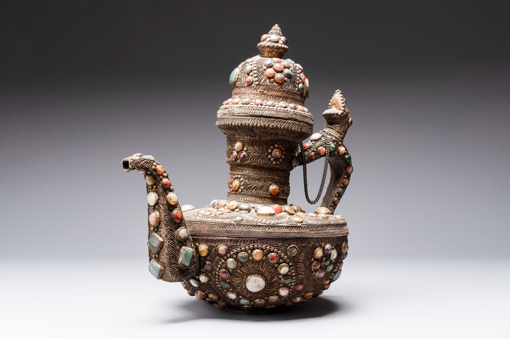 A massive Tibetan stone-inlaid copper filigree ewer and cover, 19/20th C.