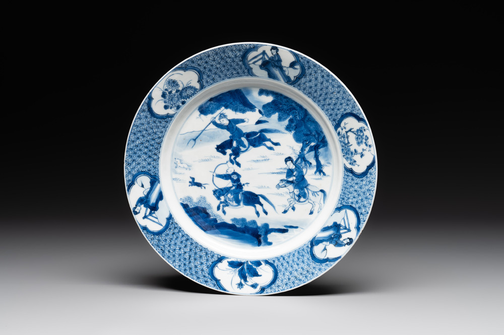 A Chinese blue and white 'rabbit hunt' dish, Chenghua mark, Kangxi