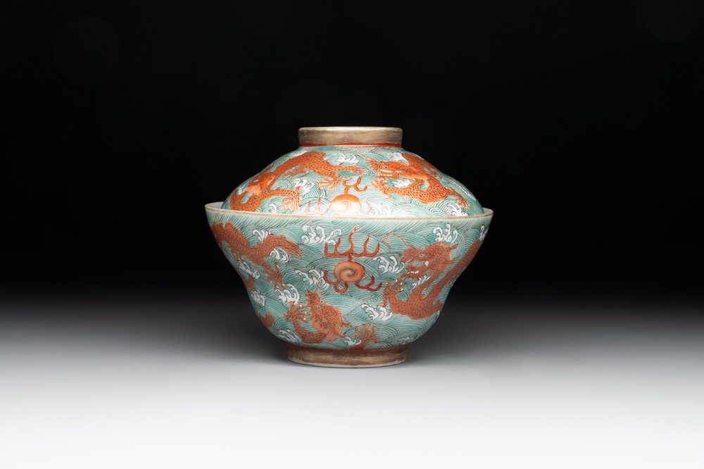 A Chinese fencai gilt-decorated 'dragons on waves' bowl and cover, Jiaqing mark, 19th C.