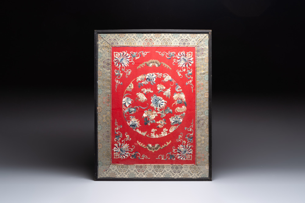 A Chinese silk embroidered felt panel with bats and flowers, 19th C.