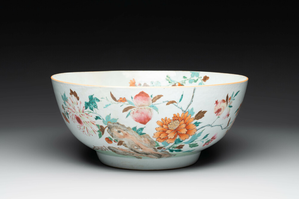 A large Chinese famille rose punch bowl with flowering and fruiting branches, Qianlong