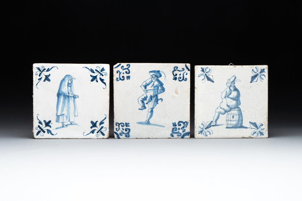 Three blue and white Dutch Delft 'large figures' tiles, 17th C.
