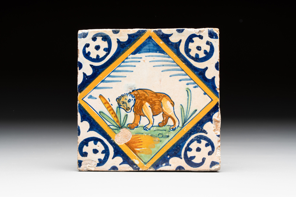 A polychrome Dutch Delft maiolica 'bear' diamond tile, late 16th C.