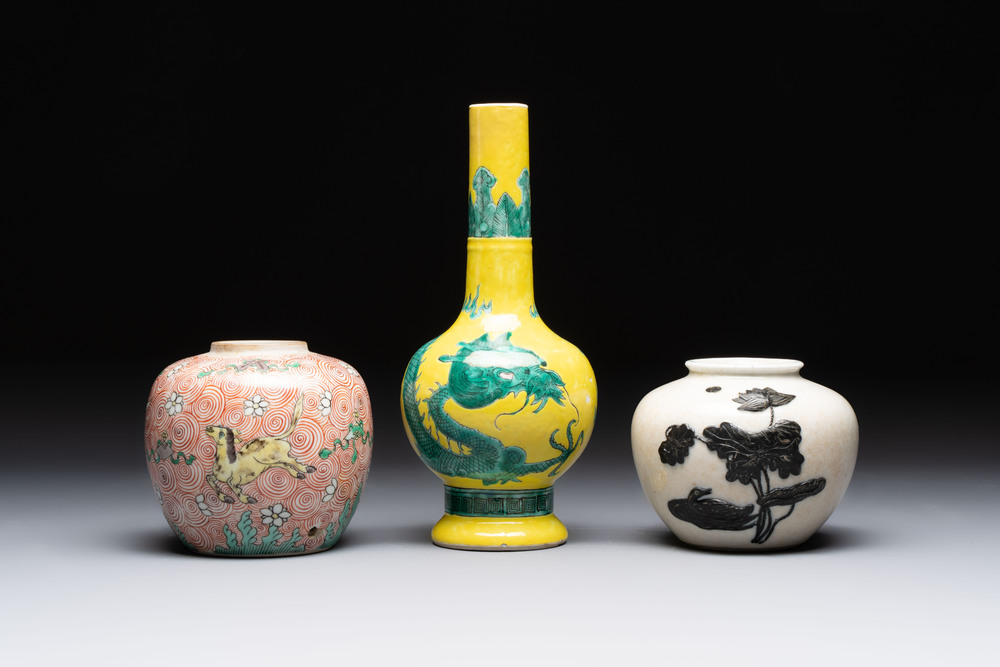A Chinese wucai 'flying horse' jar, a green-enamelled yellow-ground 'dragon' vase and a Nanking crackle-glazed jar, 19th C.