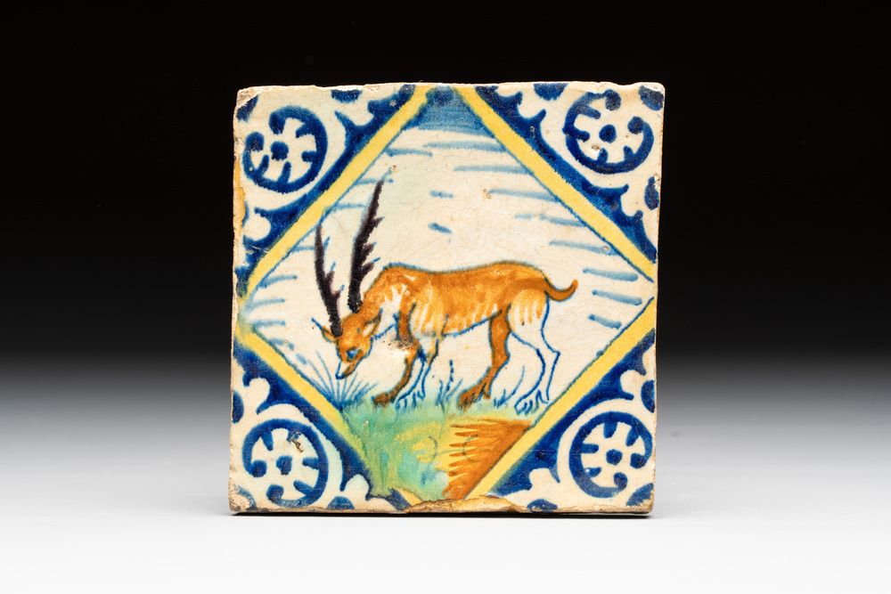 A polychrome Dutch Delft maiolica 'stag' diamond tile, late 16th C.