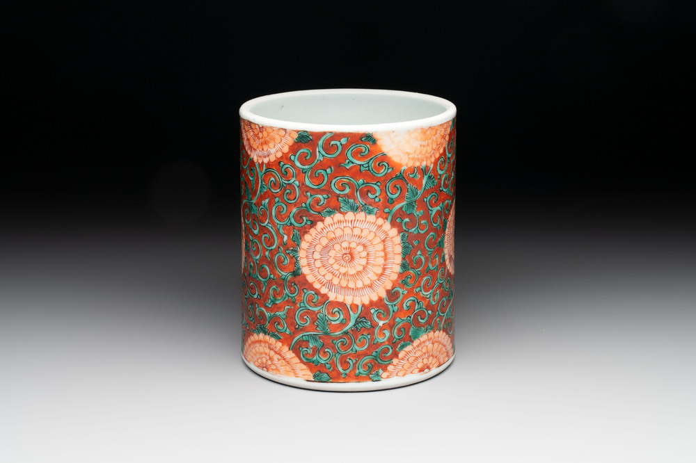A Chinese famille verte coral-red-ground 'chrysanthemum scroll' brush pot, Kangxi