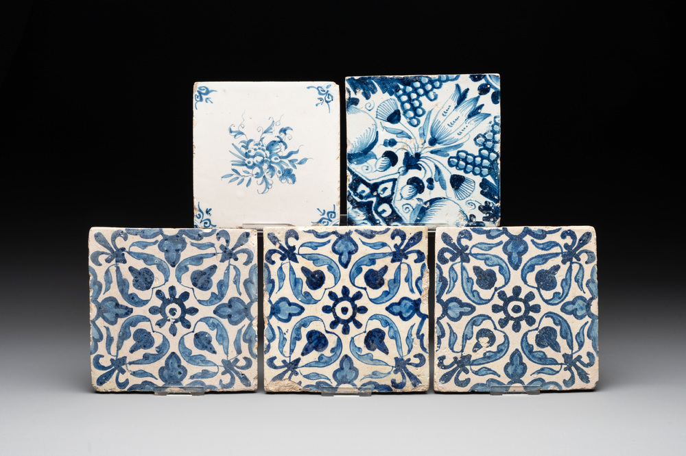 Five blue and white Dutch Delft tiles with floral design, 17th C.