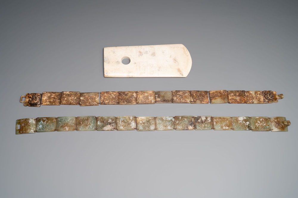 Two jade belts and a jade ritual axe, 20th C.
