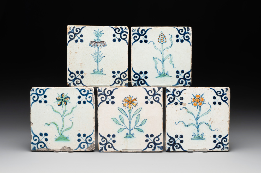 Five polychrome Dutch Delft 'flower' tiles, 17th C.