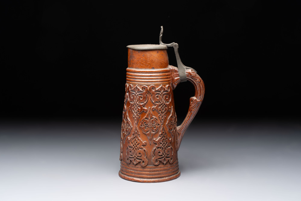 A Beauvais stoneware tankard, France, 19th C.