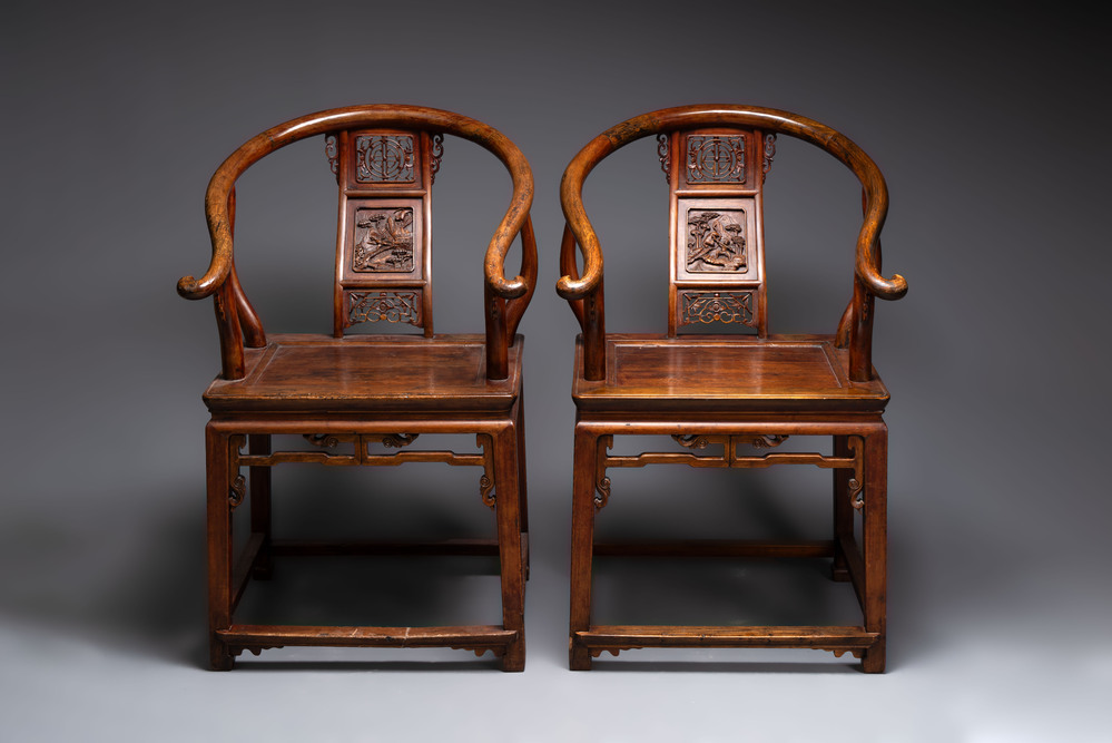 A pair of Chinese wooden 'horseshoe' chairs, 19/20th C.