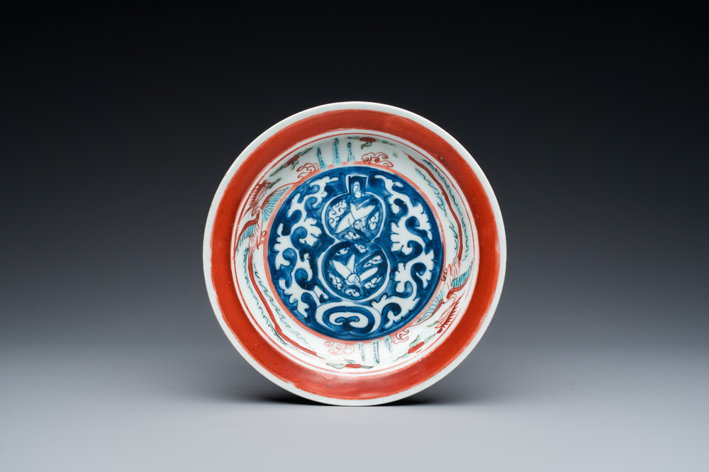 A rare Chinese Kinrande 'cranes and phoenixes' plate, Ming