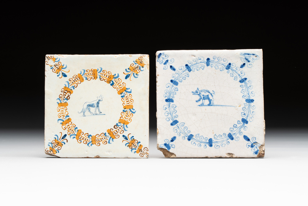 A polychrome and a blue and white Dutch Delft tile with an animal in an aigrette border, Haarlem, early 17th C.