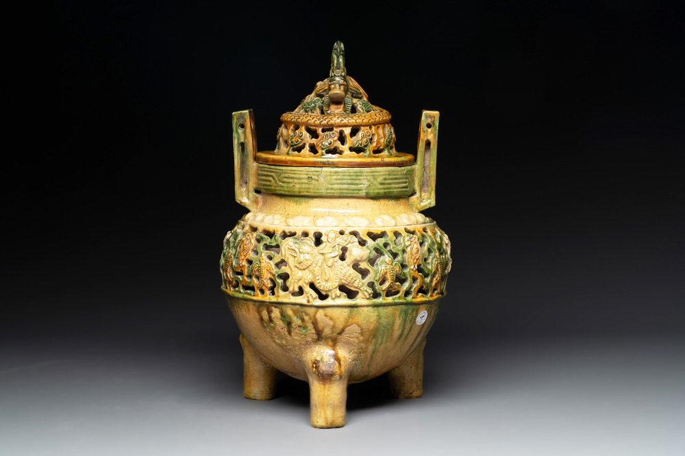 A Chinese sancai-glazed reticulated double-walled tripod censer and cover, Ming
