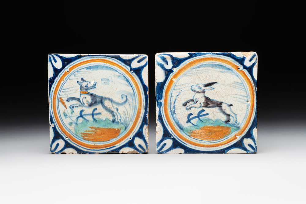 Two polychrome Dutch Delft maiolica 'dog' and 'hare' medallion tiles, late 16th C.