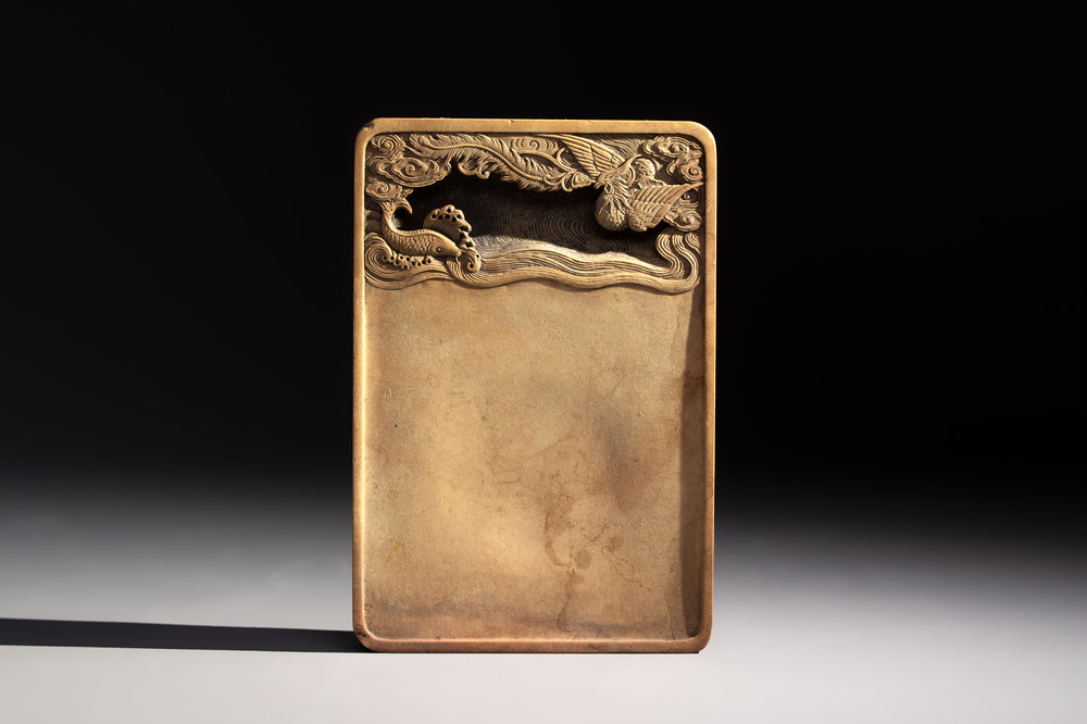A Chinese ink stone with phoenix and carp design, Qianlong mark and possibly of the period