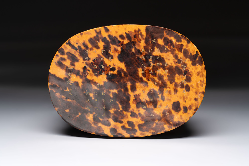 A fine and rare Chinese tortoiseshell-veneered and red-lacquered oval box and cover, signed Wang Wenzhi 王文治, Qianlong mark and of the period