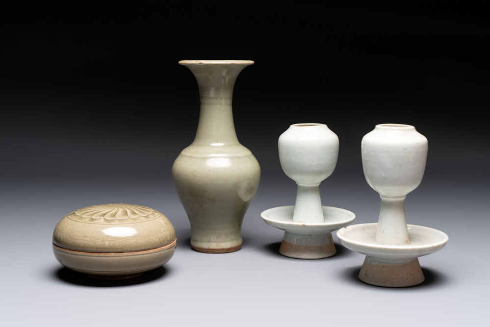 A pair of white-glazed oil lamps, a Longquan celadon vase and Yaozhou celadon box and cover, Ming/Qing