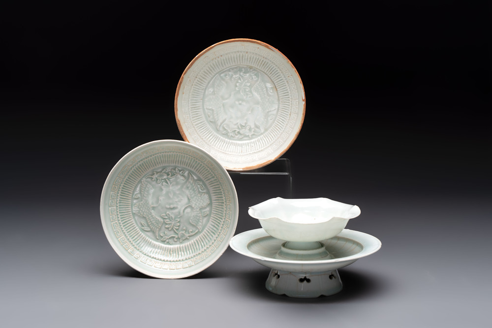 A pair of Chinese qingbai 'crane' plates and a tea bowl with stand, Song/Yuan