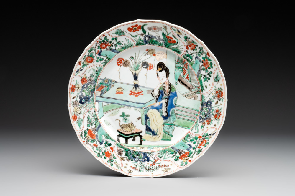 A Chinese famille verte 'lady and her cat' dish, Ding mark, Kangxi