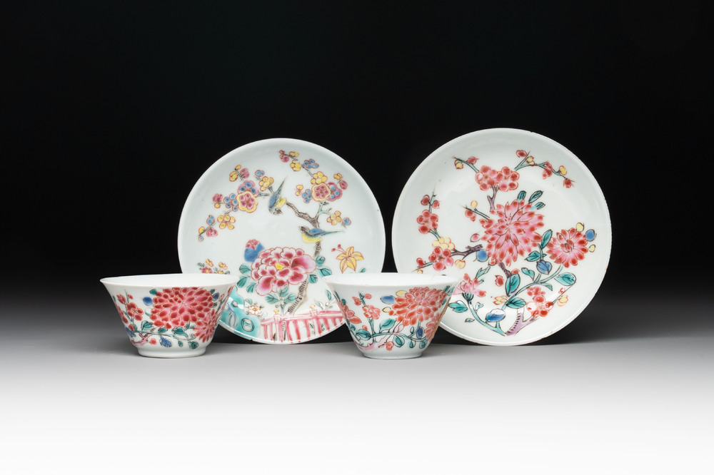 Two Chinese famille rose cups and saucers with birds and flowering branches, Yongzheng