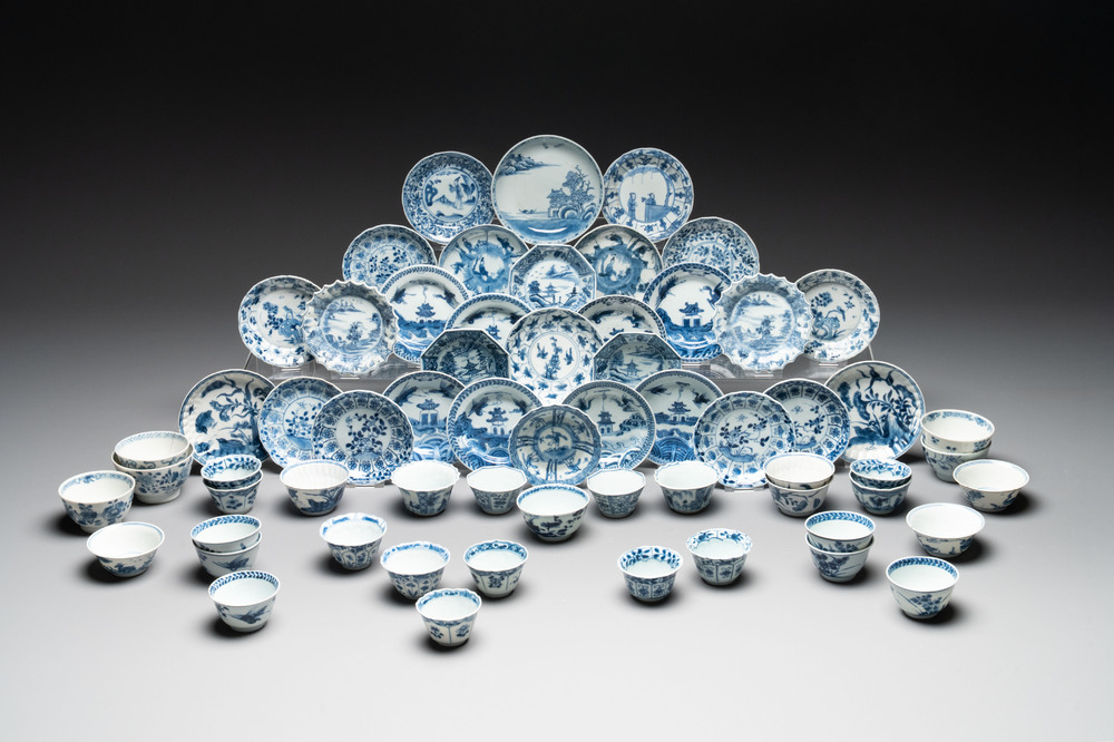 A massive collection of 32 Chinese blue and white cups and 30 saucers, Kangxi/Qianlong