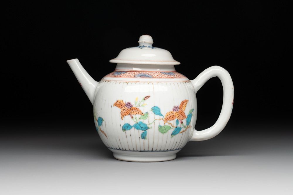 A Chinese famille rose teapot and cover with floral design, Yongzheng/Qianlong